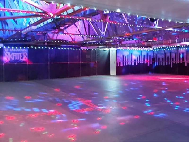 Laser skate rink repurposing old booms